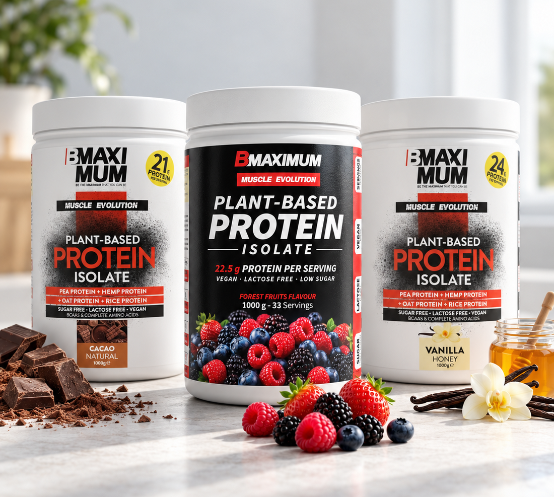 Three white protein powder tubs from BMaximumum are displayed on a marble countertop with food props. The center tub is Plant-Based Protein Isolate, and the side tubs are Plant-Based Protein Isolate in Cacao Nutritional Flavour and Vanilla Honey Flavour.